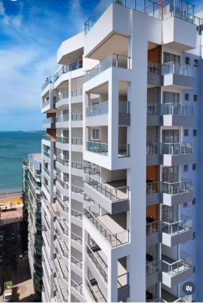 Apartamento NOvo na Praia do Morro Temporada Wi-Fi, Vista Mar, garagem, varanda grande